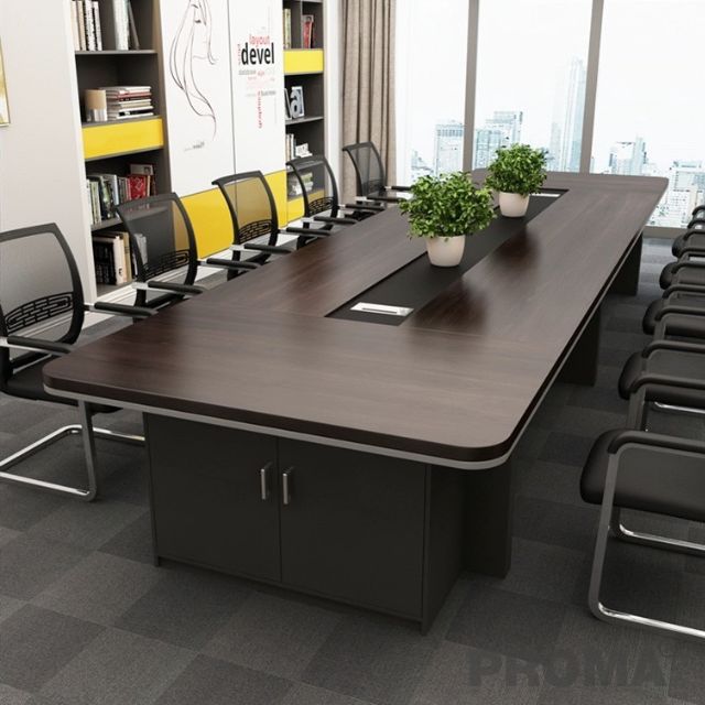 Large rectangular conference table Modern design, accommodates 10-12 people.